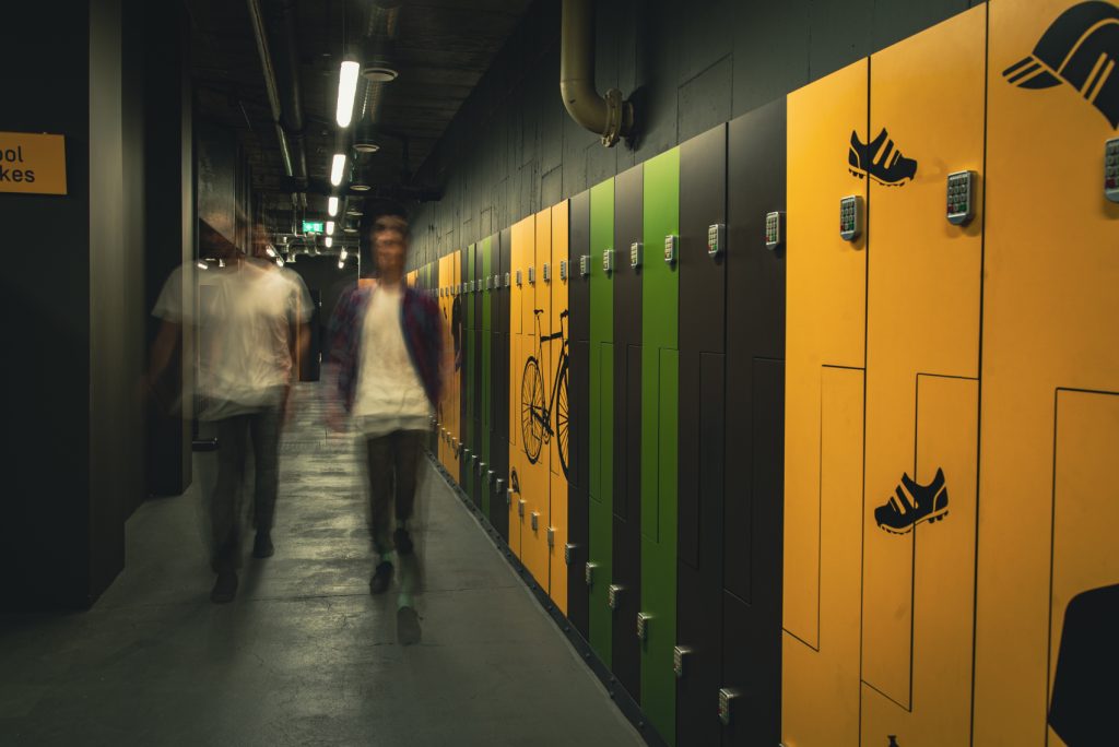 end of trip facilities with two tier bike racks and lockers